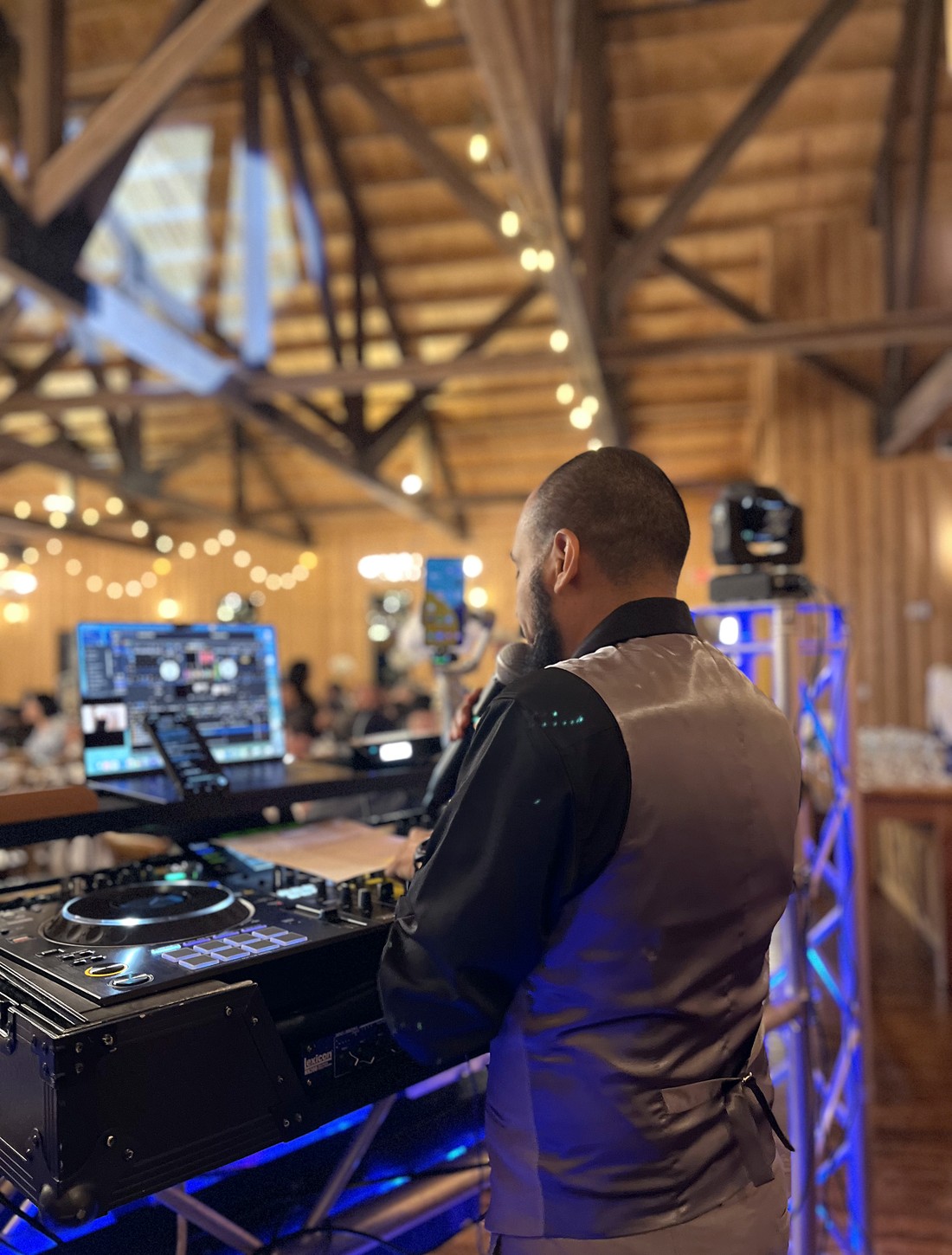 At the booth during a barn wedding reception in Houston