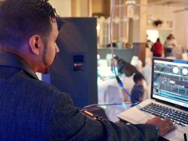 Working the booth during a ballroom celebration